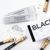 Blackwing Lab 11.25.22 pencils and erasers on a white background.